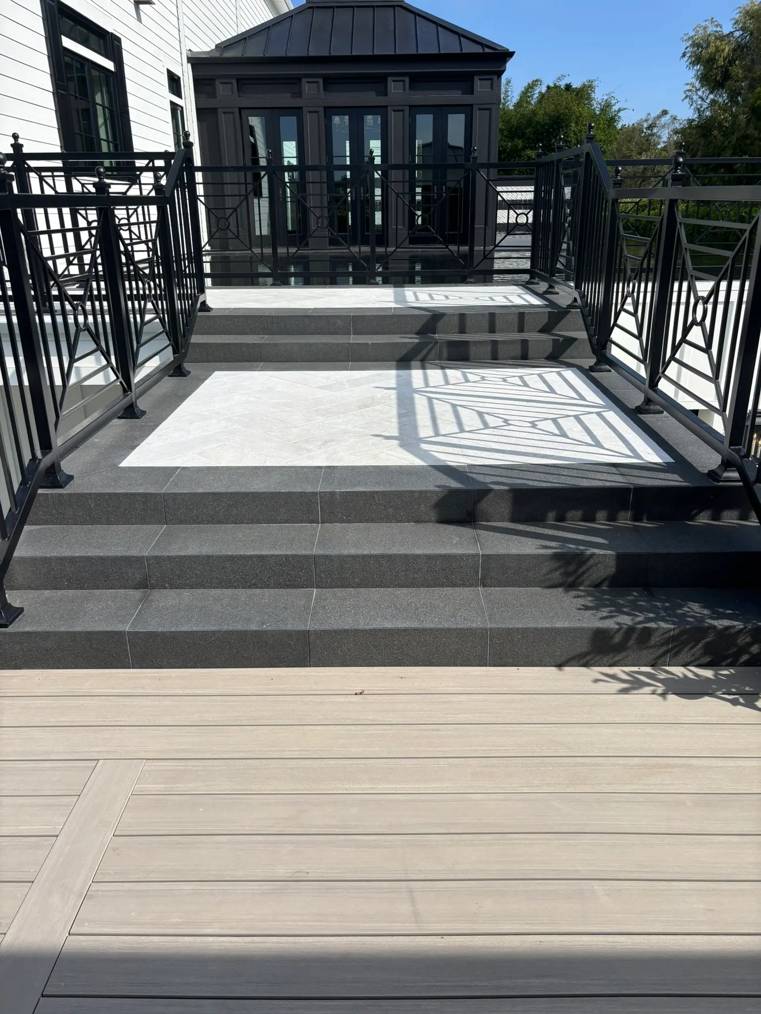 Custom outdoor living area with pavers