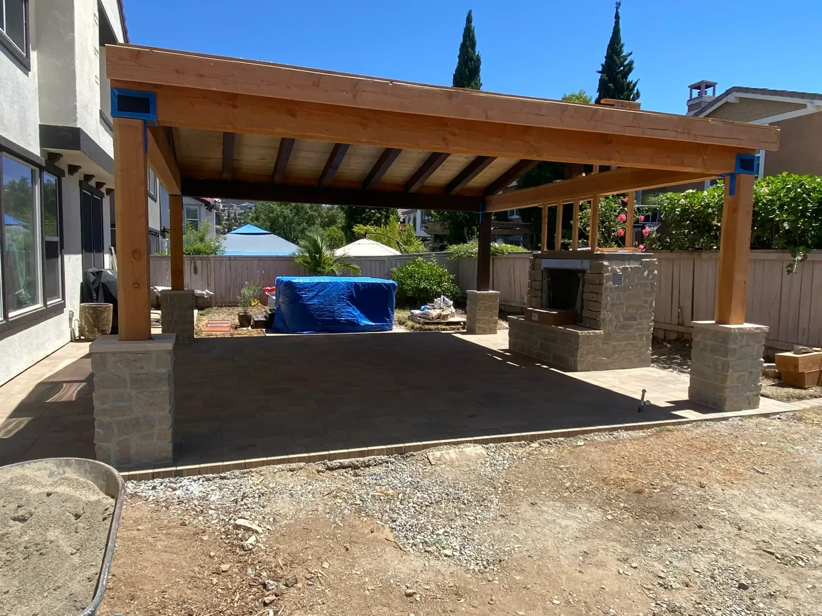 Paver patio with clean layout tailored to the home
