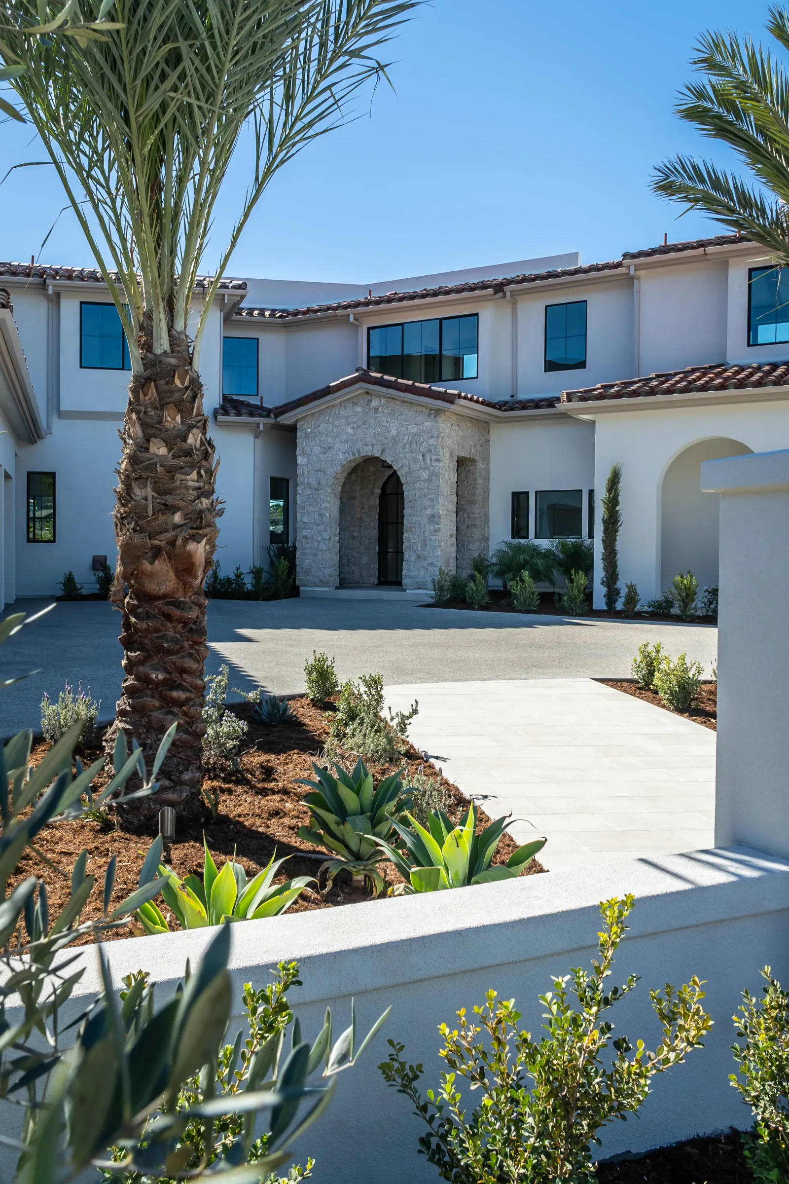 Proper base preparation and compaction under pavers