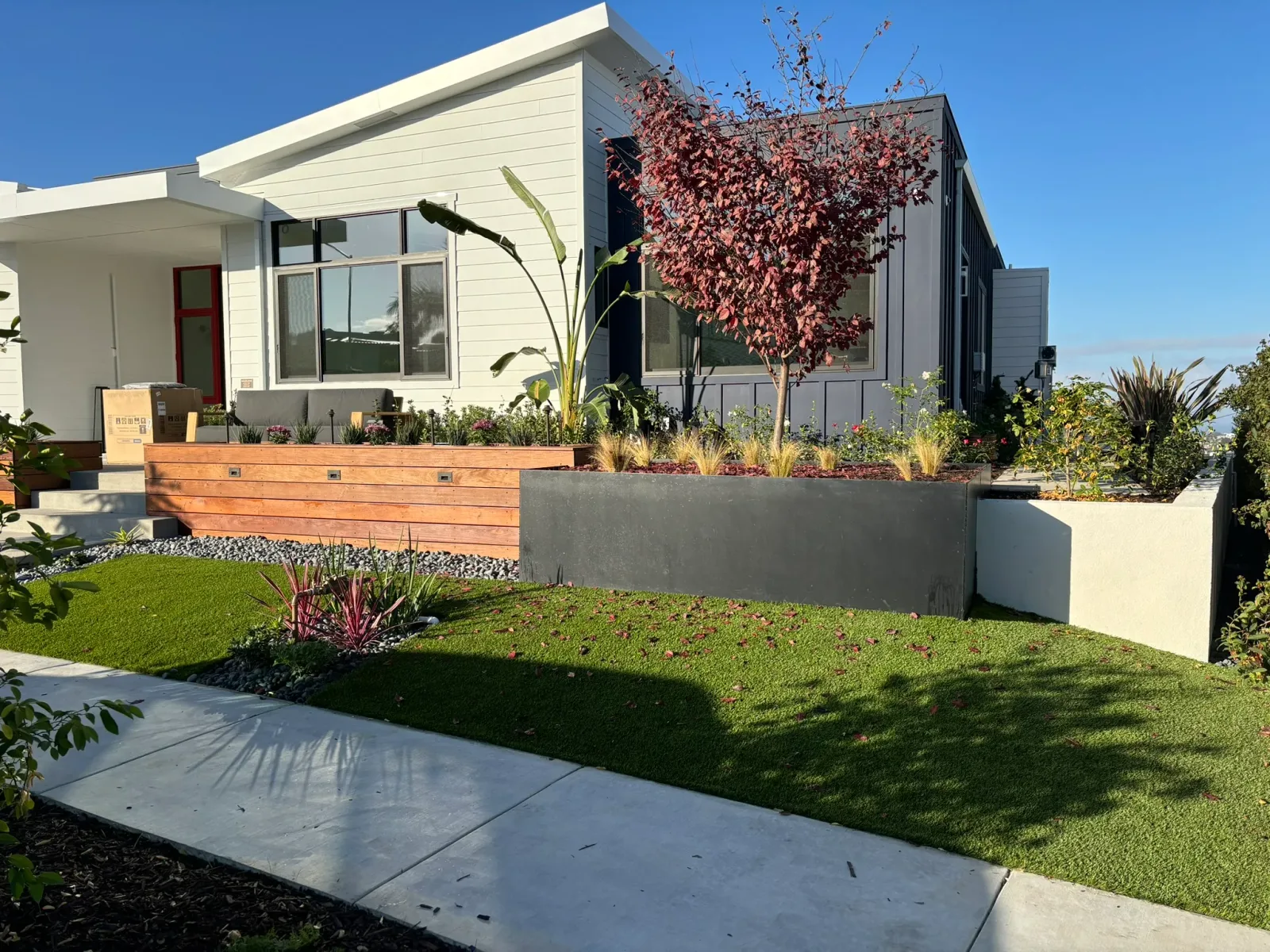 Poway backyard with paver patio, retaining wall, and Iron Mountain foothills in the distance